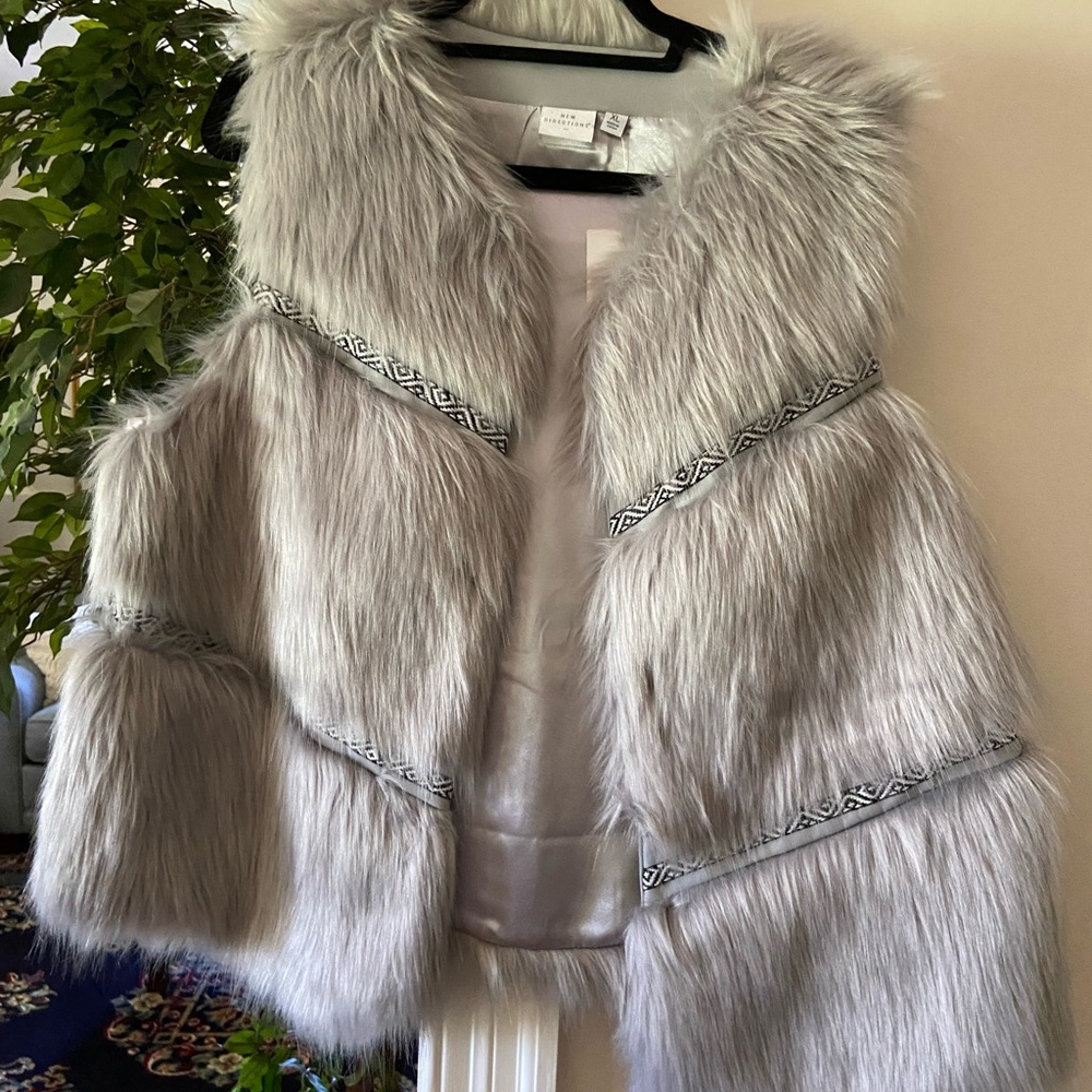 Gray vest. Brand new! Lined and of good quality!